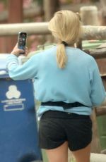 REESE WITHERSPOON Taking Selfies with Local Horses in Los Angeles 04/16/2024