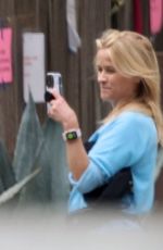 REESE WITHERSPOON Taking Selfies with Local Horses in Los Angeles 04/16/2024