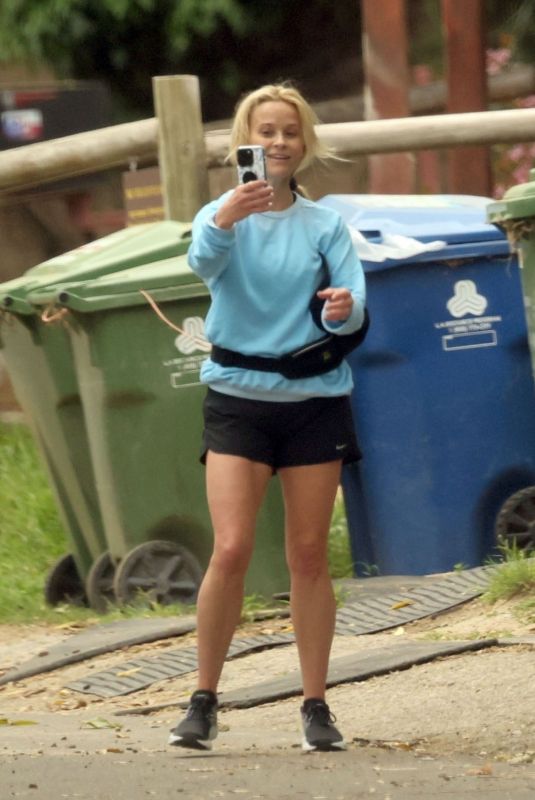 REESE WITHERSPOON Taking Selfies with Local Horses in Los Angeles 04/16/2024
