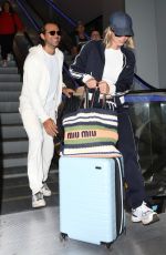 SYDNEY SWEENEY and Jonathan Davin Leaves LAX Airport in Los Angeles 04/26/2024