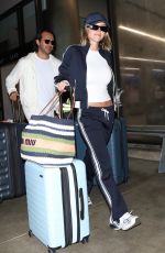 SYDNEY SWEENEY and Jonathan Davin Leaves LAX Airport in Los Angeles 04/26/2024