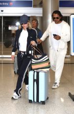 SYDNEY SWEENEY and Jonathan Davin Leaves LAX Airport in Los Angeles 04/26/2024