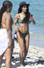 TEYANA TAYLOR in Bikini at a Beach in Miami Beach 04/01/2024