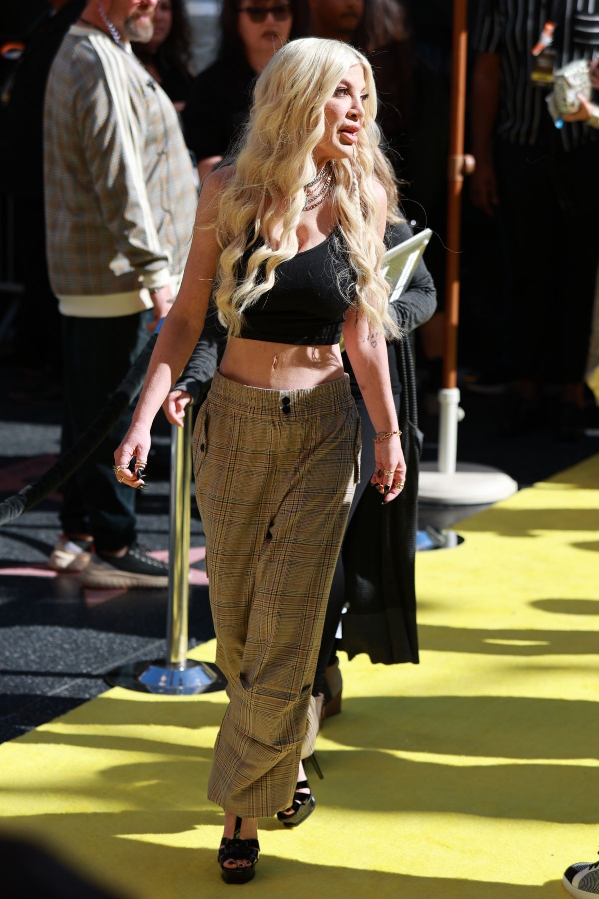 TORI SPELLING Arrives at 2024 iHeartRadio Music Awards in Hollywood 04