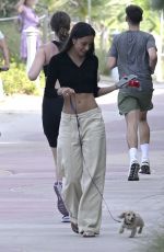 ALEXANDRA SAINT MLEUX And Charles Leclerc Out with Their Dog at a Beach in Miami 04/29/2024