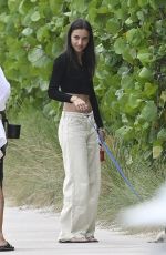 ALEXANDRA SAINT MLEUX And Charles Leclerc Out with Their Dog at a Beach in Miami 04/29/2024