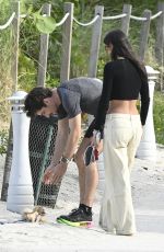 ALEXANDRA SAINT MLEUX And Charles Leclerc Out with Their Dog at a Beach in Miami 04/29/2024