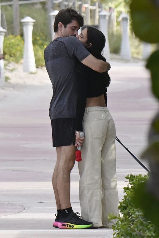 ALEXANDRA SAINT MLEUX And Charles Leclerc Out with Their Dog at a Beach in Miami 04/29/2024