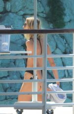 ANJA RUBIK in Swimsuit at Hotel du Cap Eden Roc in Cannes 05/22/2024