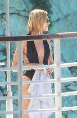 ANJA RUBIK in Swimsuit at Hotel du Cap Eden Roc in Cannes 05/22/2024