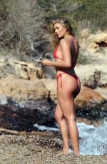 ARABELLA CHI in Bikini at a Beach in Ibiza 05/28/2024