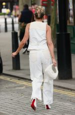 ASHLEY ROBERTS Arrives at Heart Radio in London 05/29/2024