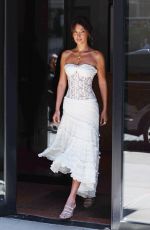 BELLA HADID in a White Strapless Lace Dress Out in New York 05/02/2024