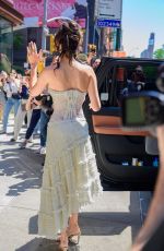 BELLA HADID in a White Strapless Lace Dress Out in New York 05/02/2024