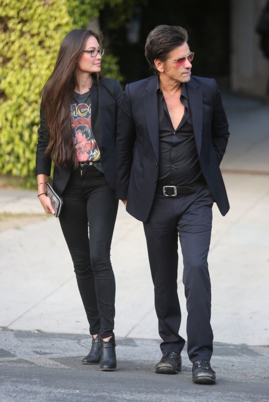 CAITLIN MCHUGH and John Stamos Arrives at Netflix is a Joke Appearance at Laugh Factory in West Hollywood 05/12/2024