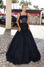 CAROLINE DAUR Leaves Hotel Martinez at 77th Cannes Film Festival 05/16/2024