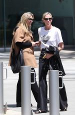 CHARLIZE THERON Leaves Netflix Building with a Friend in Los Angeles 05/08/2024