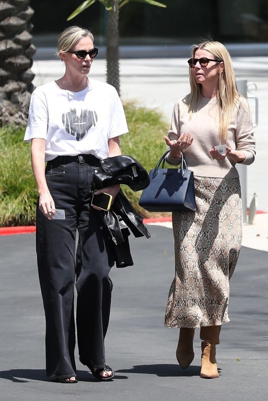 CHARLIZE THERON Leaves Netflix Building with a Friend in Los Angeles 05/08/2024