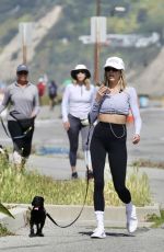 CHARLOTTE MCKINNEY Out with Her Dog at a Beach in Santa Monica 05/01/2024