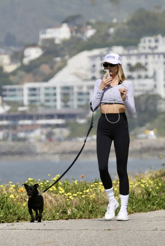 CHARLOTTE MCKINNEY Out with Her Dog at a Beach in Santa Monica 05/01/2024
