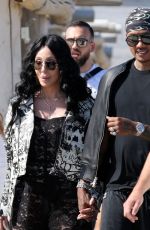 CHER and Alexander AE Edwards Arrives at Club 55 in St Tropez 05/26/2024