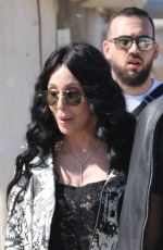 CHER and Alexander AE Edwards Arrives at Club 55 in St Tropez 05/26/2024