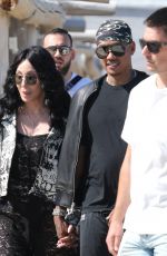 CHER and Alexander AE Edwards Arrives at Club 55 in St Tropez 05/26/2024