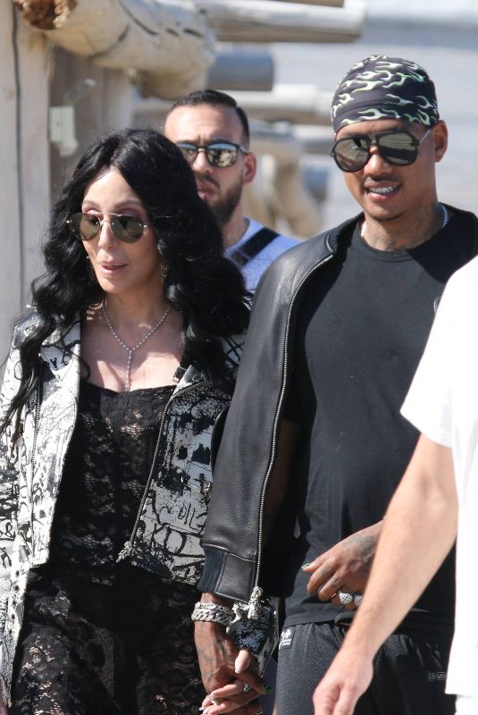 CHER and Alexander AE Edwards Arrives at Club 55 in St Tropez 05/26/2024