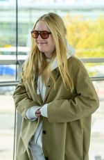 DAKOTA FANNING Arrives at Heathrow Airport in London 05/27/2024