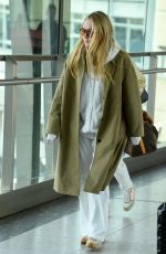 DAKOTA FANNING Arrives at Heathrow Airport in London 05/27/2024