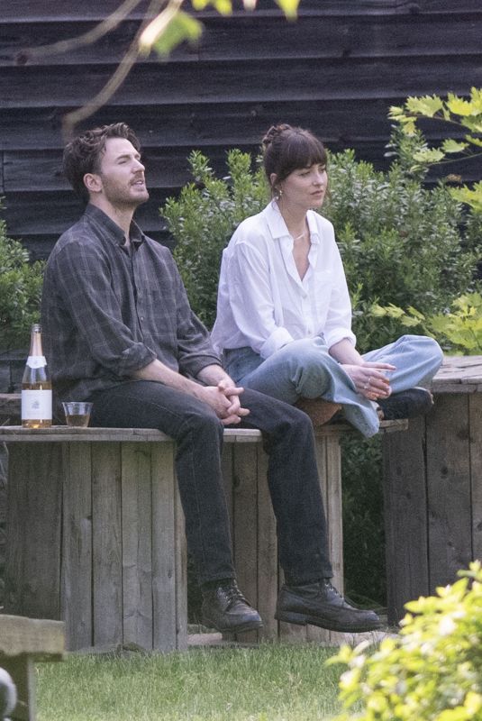 DAKOTA JOHNSON and Chris Evans on the Set of The Materialists in New York 05/22/2024