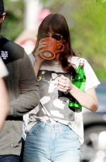 DAKOTA JOHNSON Taking a Break from Filming Materialists in New York 05/08/2024