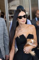 DEMI MOORE Leaves Hotel Martinez at 77th Cannes Film Festival 05/19/2024
