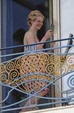 ELLA FANNING at a Photoshoot at Martinez Hotel in Cannes 05/24/2024