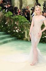 ELLE FANNING at Met Gala Celebrating Sleeping Beauties: Reawakening Fashion in New York 05/06/2024