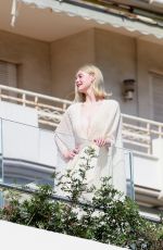 ELLE FANNING Doing a Photoshoot at Hotel Martinez in Cannes 05/25/2024