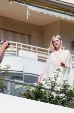 ELLE FANNING Doing a Photoshoot at Hotel Martinez in Cannes 05/25/2024