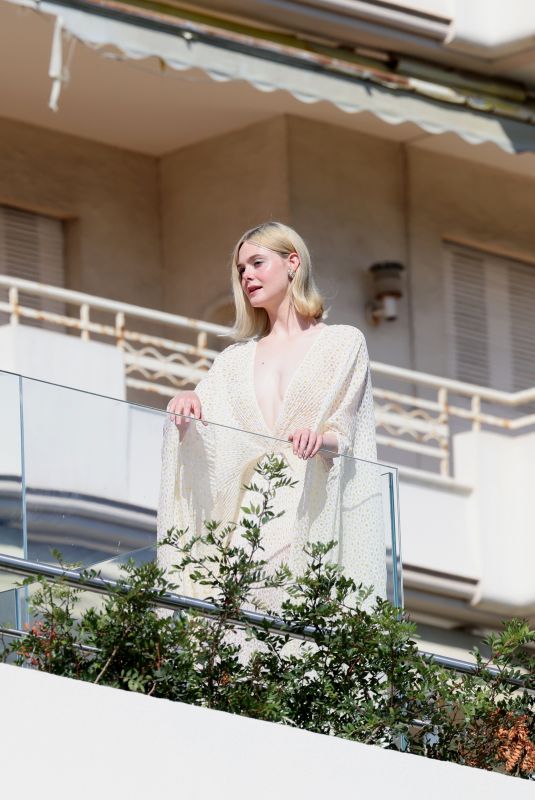 ELLE FANNING Doing a Photoshoot at Hotel Martinez in Cannes 05/25/2024