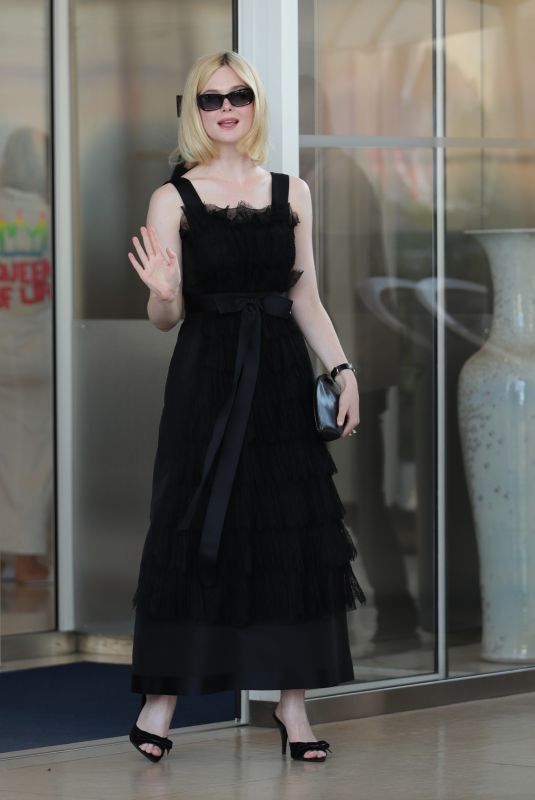 ELLE FANNING Leaves Hotel Martinez in Cannes 05/24/2024