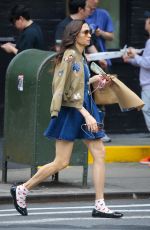 FAMKE JANSSEN Out Carrying a Bouquet of Flowers in New York 05/18/2024