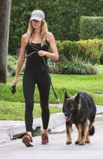 GISELE BUNDCHEN Out for a Mrning Walk with Her Dog in Miami 04/30/2024