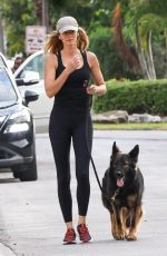GISELE BUNDCHEN Out for a Mrning Walk with Her Dog in Miami 04/30/2024