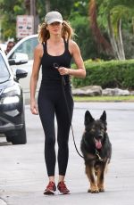 GISELE BUNDCHEN Out for a Mrning Walk with Her Dog in Miami 04/30/2024