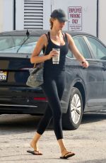 GISELE BUNDCHEN Out for Morning Walk with Her Dog in Miami 05/09/2024