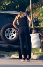 GISELE BUNDCHEN Walks Around Her House in Miami 05/18/2024
