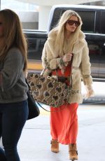 JESSICA SIMPSON Arrives at LAX Airport in Los Angeles 05/29/2024