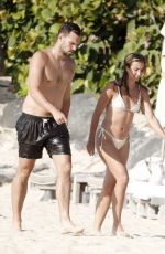KATIE AUSTIN in Bikini and Lane Armstrong at a Beach in St. Barts 05/16/2024