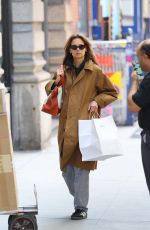 KATIE HOLMES Returns to Her Apartment After Shopping in New York 05/13/2024