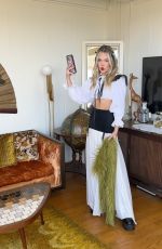 KELLI BERGLUND at a Photoshoot 05/28/2024