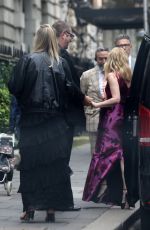 KYLIE MINOGUE Leaves Her Hotel with Friends to Celebrate Her Birthday in London 05/28/2024